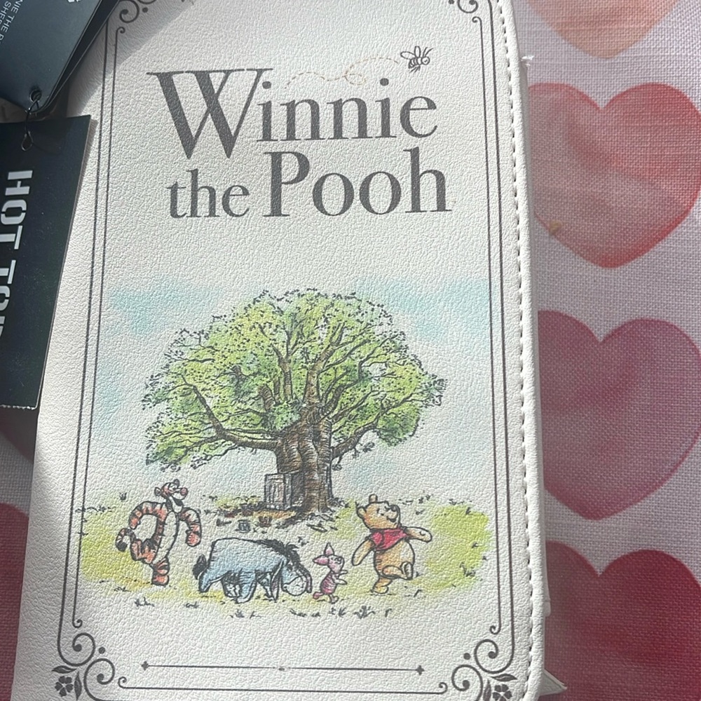 Launch flying Disney Winnie the Pooh wallet to put your cell phone